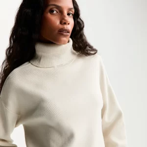 Blusa tricot ampla gola alta